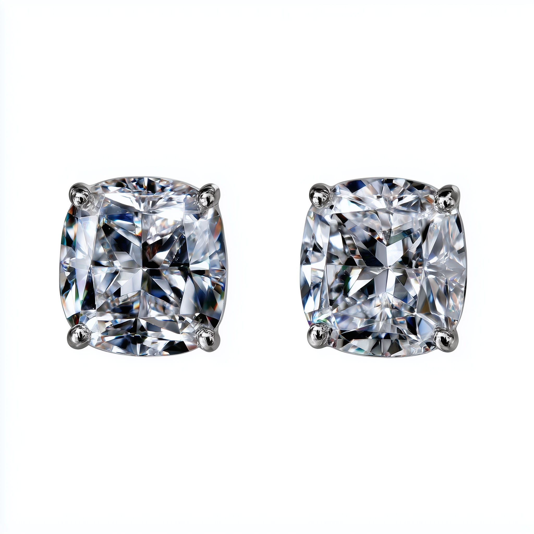 Pair of diamond stud earrings on a white background